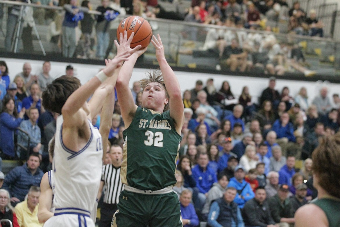 MARK NELKE/Press
St. Maries sophomore Xavier Sloper shoots against Cole Valley Christian in the first round of the state 2A boys basketball tournament Thursday at Capital High in Boise.