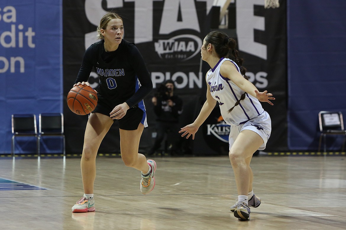 Warden senior Lauryn Madsen, left, led the Cougars with 28 points in their win over Mabton in the 2B Girls State Basketball Tournament quarterfinals Wednesday.