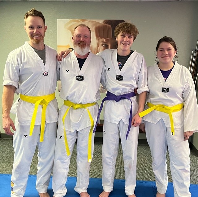 The Sandpoint Martial Arts Adult/Teen Group. From left, Allen Hughes (Yellow Belt), Philip Bergen (Yellow Belt), Harald Bergen (Purple Belt), and Ellie Howard (Yellow Belt).