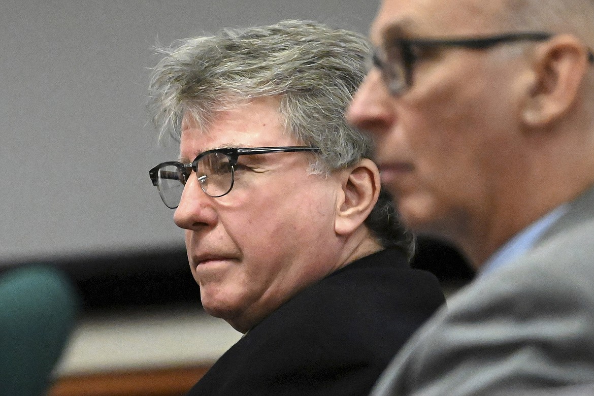 Defendant Kevin Monahan, left, listens to opening statements in his murder trial, Jan. 11, 2024, at the Washington County Courthouse in Fort Edward, N.Y. Monahan, who fatally shot a 20-year-old woman when the SUV she was riding in mistakenly pulled into his rural driveway, could face decades in prison at his sentencing, which is scheduled for Friday, March 1, 2024. (Will Waldron/The Albany Times Union via AP, Pool, File)
