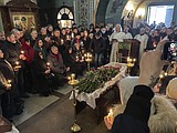 Putin foe Alexei Navalny is buried in Moscow as thousands attend under a heavy police presence