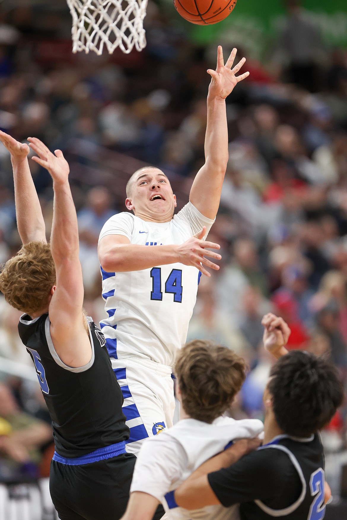 JASON DUCHOW PHOTOGRAPHY
Coeur d'Alene junior forward Kai Wheeler puts up a shot during the second half of Friday's state 5A boys basketball semifinal game at the Ford Idaho Center in Nampa.