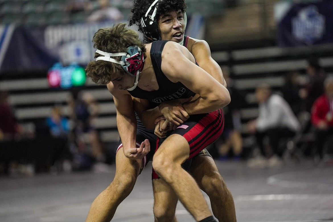 ELI MICHAEL/North Idaho College
North Idaho College freshman Elijah Cater takes on Kolton Misener of Labette during the second round of the NJCAA Championships in Council Bluffs, Iowa.