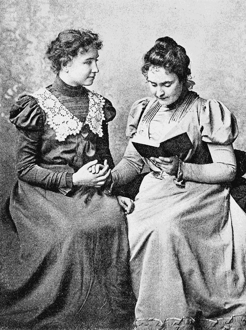 Helen Keller with lifelong companion and teacher Anne Sullivan in 1899. This photo was taken by Alexander Graham Bell at his School of Vocal Physiology and Mechanics of Speech. Keller was known for being blind, deaf and mute until Sullivan entered her life and helped her learn to communicate despite her disabilities.