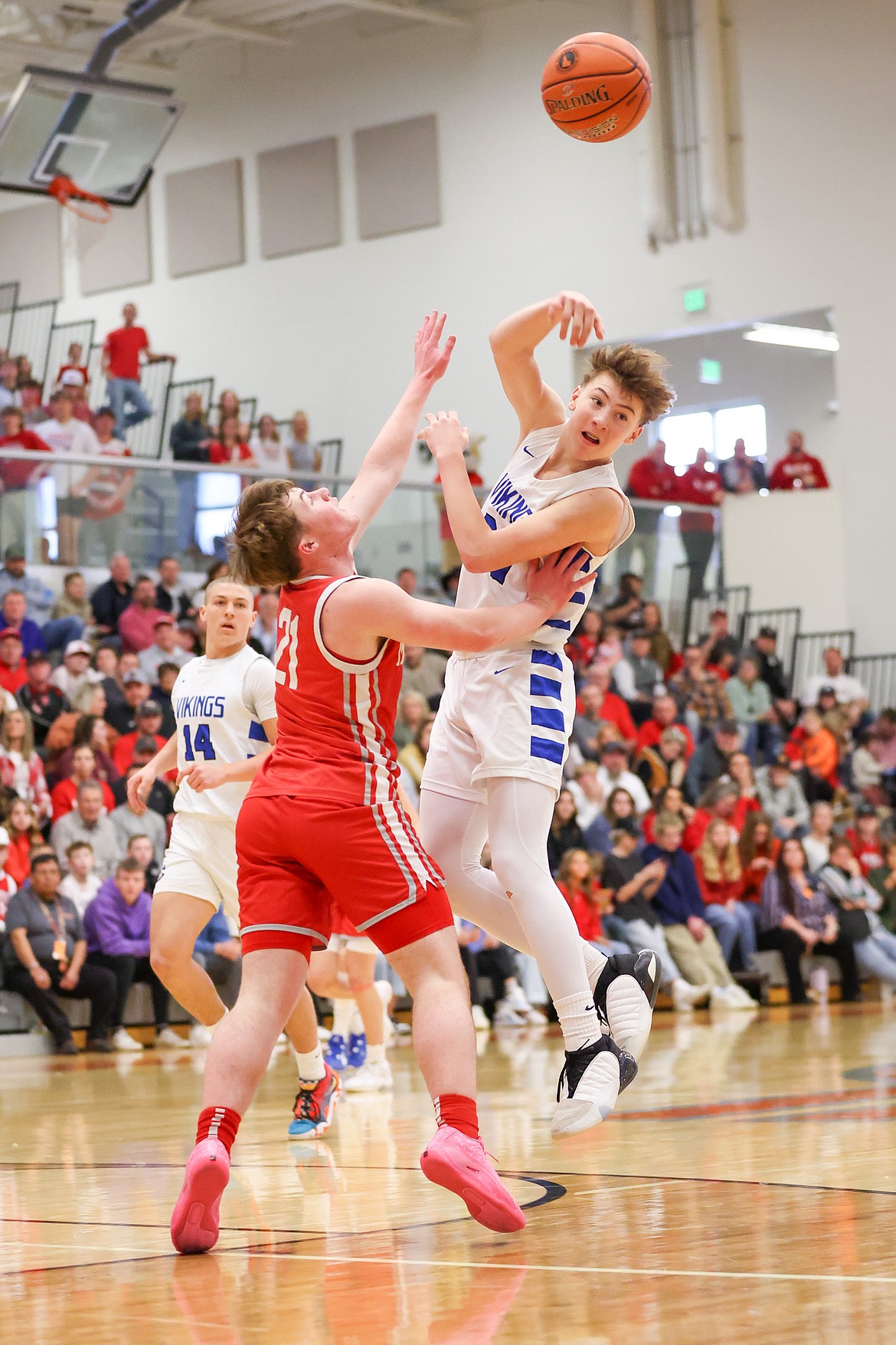 JASON DUCHOW PHOTOGRAPHY
Coeur d'Alene sophomore guard Caden Symons attempts to pass out of the Madison defense during Saturday's state 5A third-place game at Ridgevue High in Nampa.