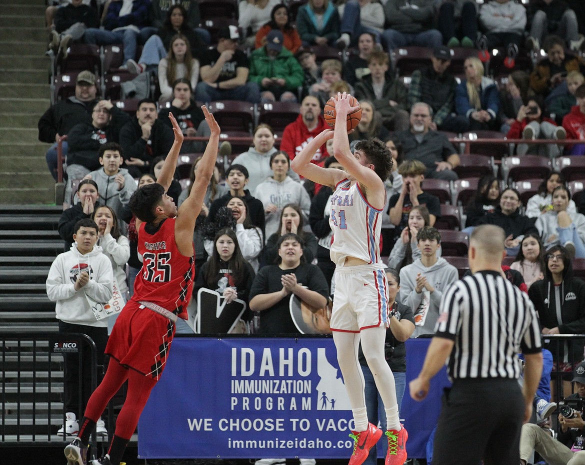 MARK NELKE/Press
Lapwai senior Kase Wynott shoots over Lakeside sophomore Tyson Charley during Saturday's state 1A Division 1 championship game at the Ford Idaho Center in Nampa.