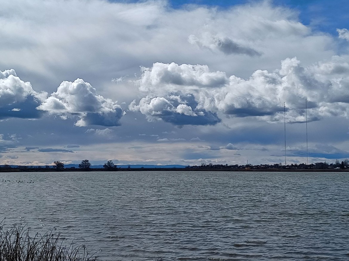 A view of Moses Lake from Montlake Park around mid-day on Saturday. This week will continue to see cloud cover in much of the Columbia Basin with a chance of rain or snow off and on as the week progresses.