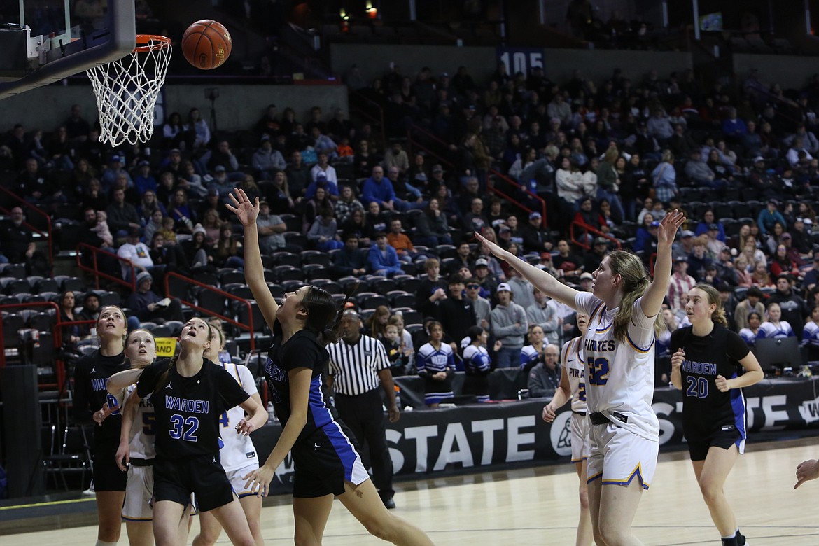 Warden freshman Angelina Buck, left in the foreground, led the Cougars with 21 points in their win over Adna Saturday. Buck connected on five-of-seven second-half three-pointers.