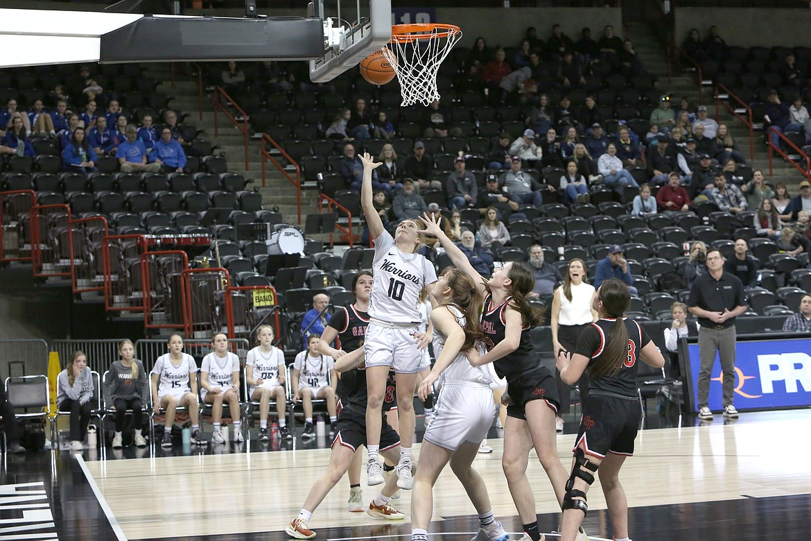 Almira/Coulee-Hartline sophomore Naomi Molitor lays the ball up against Garfield-Palouse at the 1B Girls State Basketball Tournament. The Warrior girls basketball team got back to the state tournament for the first time since the 2018-19 season.