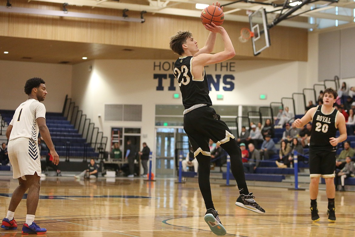 Royal senior Caden Allred (23) shoots the ball in the Knights’ regional game against No. 3 seed Annie Wright.