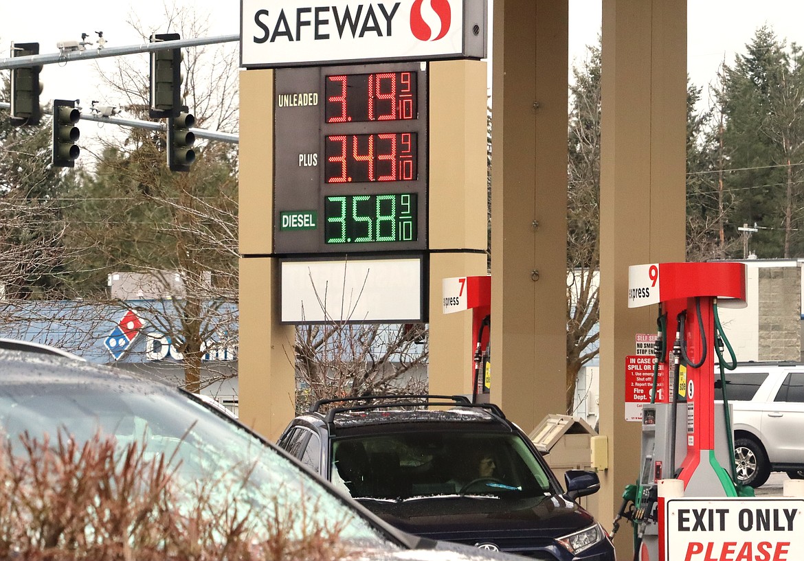 A driver stops at Safeway on Neider Avenue for gas. Fuel prices have been climbing in Idaho.