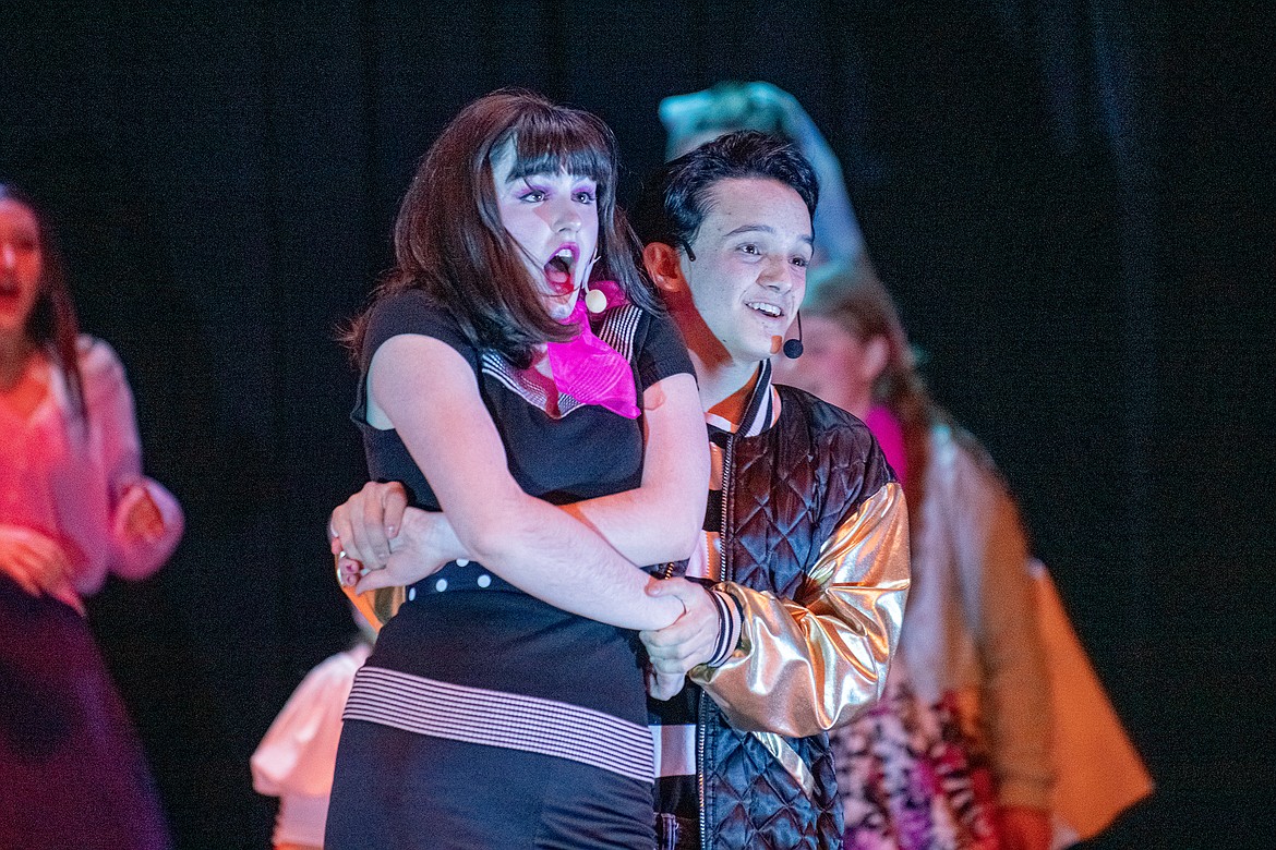 Audrey Hanley as Kim MacAfee and Cash Byrd ad Conrad Birdie dance in Columbia Falls High School’s opening night of “Bye Bye Birdie” at the Little Theater on Thursday, Feb. 28. (Avery Howe photo)