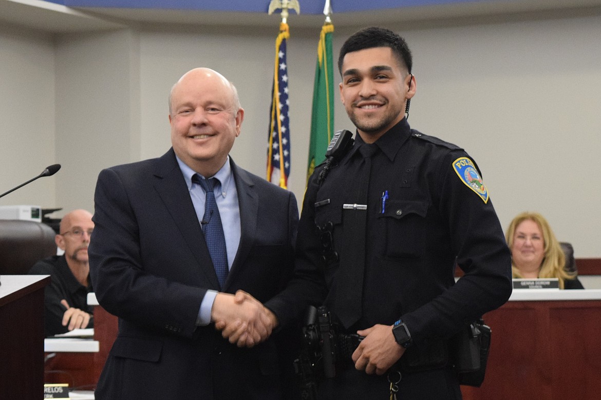 Othello Police Officer Omar Ledesma, right, was sworn in during Monday’s regular Othello City Council meeting by Mayor Shawn Logan, left.