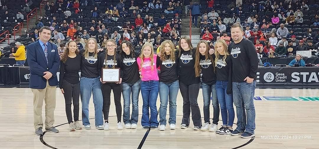 The Soap Lake girls basketball team accepted its Class 1B academic state championship during the state basketball tournament last week.