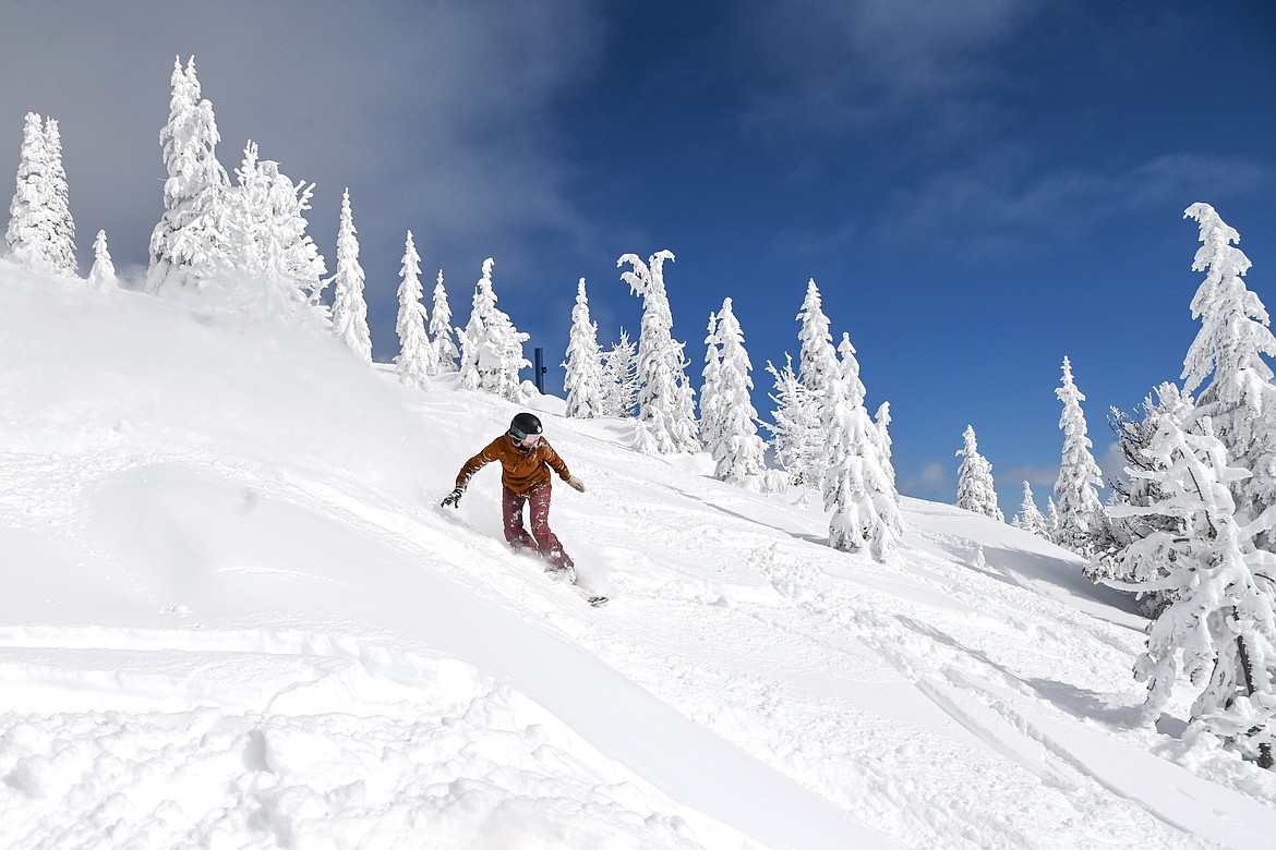 A skier enjoys the snowy slopes of Schweitzer Ski Resort this week.