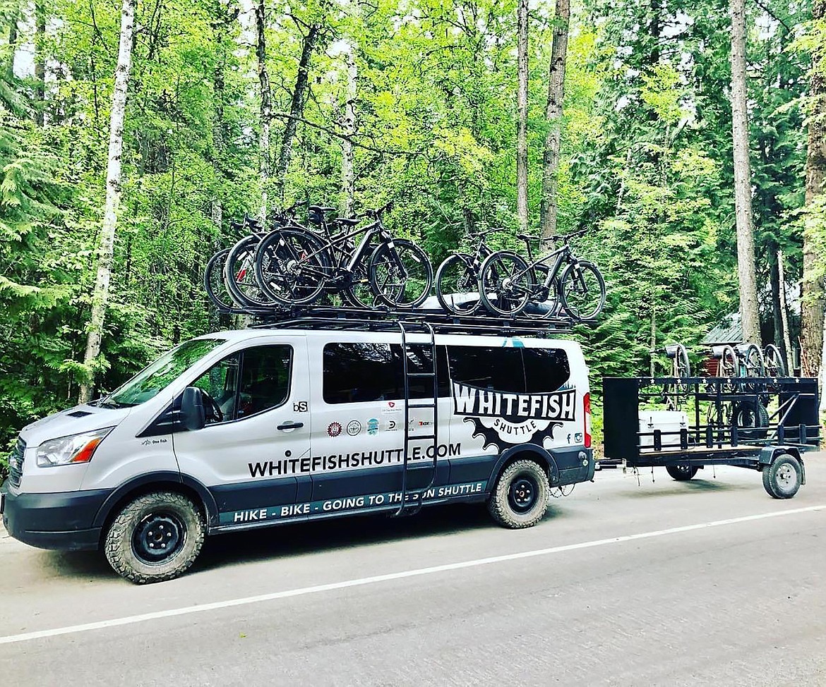 Whitefish Outfitters' shuttle van and trailer loaded for a bike tour. (Photo provided)