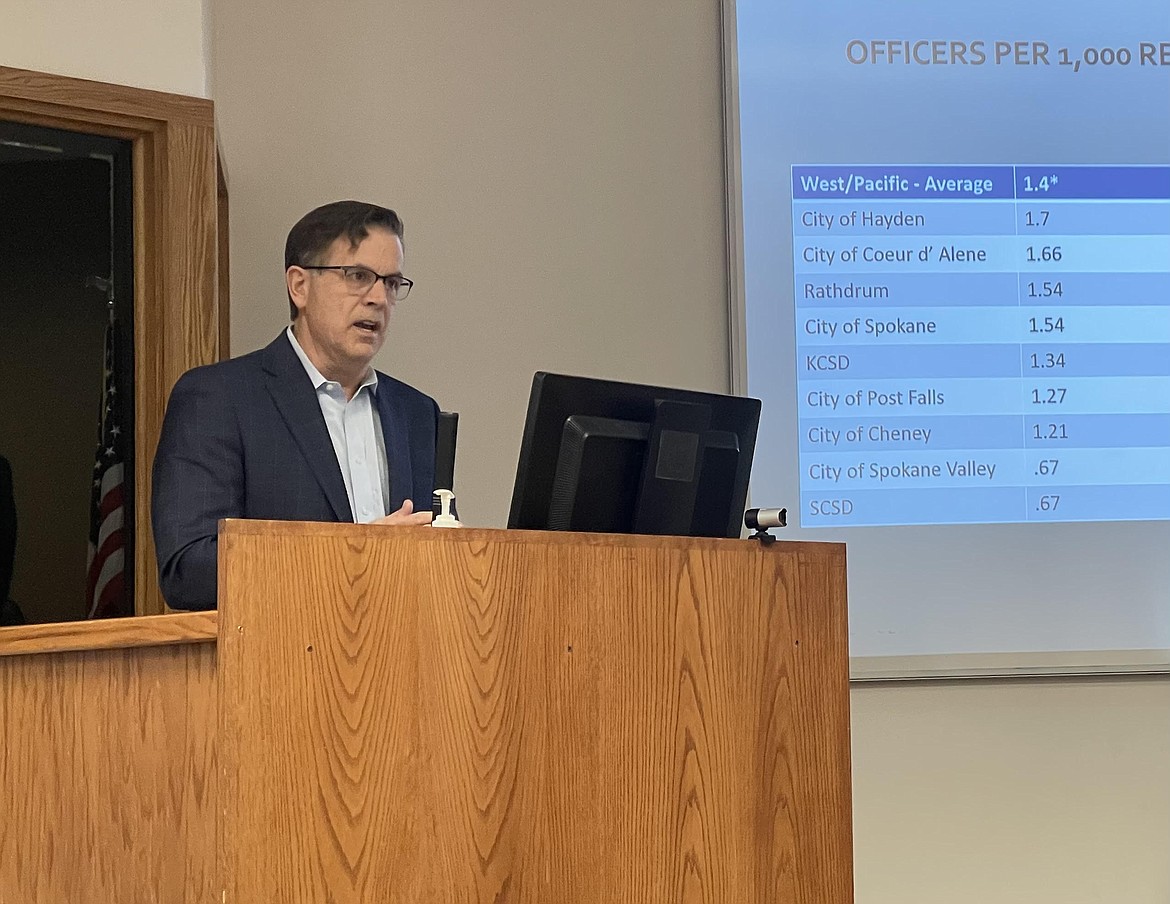Hayden Public Safety Commission Chairman Scot Haug explains some municipalities measure how many officers per 1,000 residents in order to determine how effectively communities are policed.