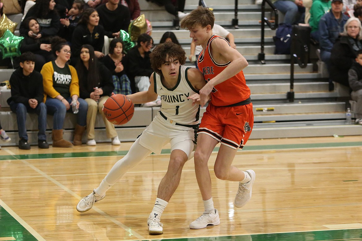 Quincy sophomore Pierce Bierlink, left, was named the Caribou Trail League Player of the Year.