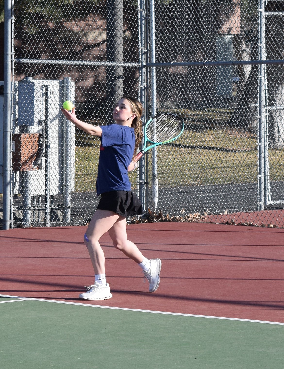 Chloe Ho practices her serve during a practice on the courts at Ephrata High School. She is one of the players coach Britney MacLeod said will help anchor the team as the season moves forward.