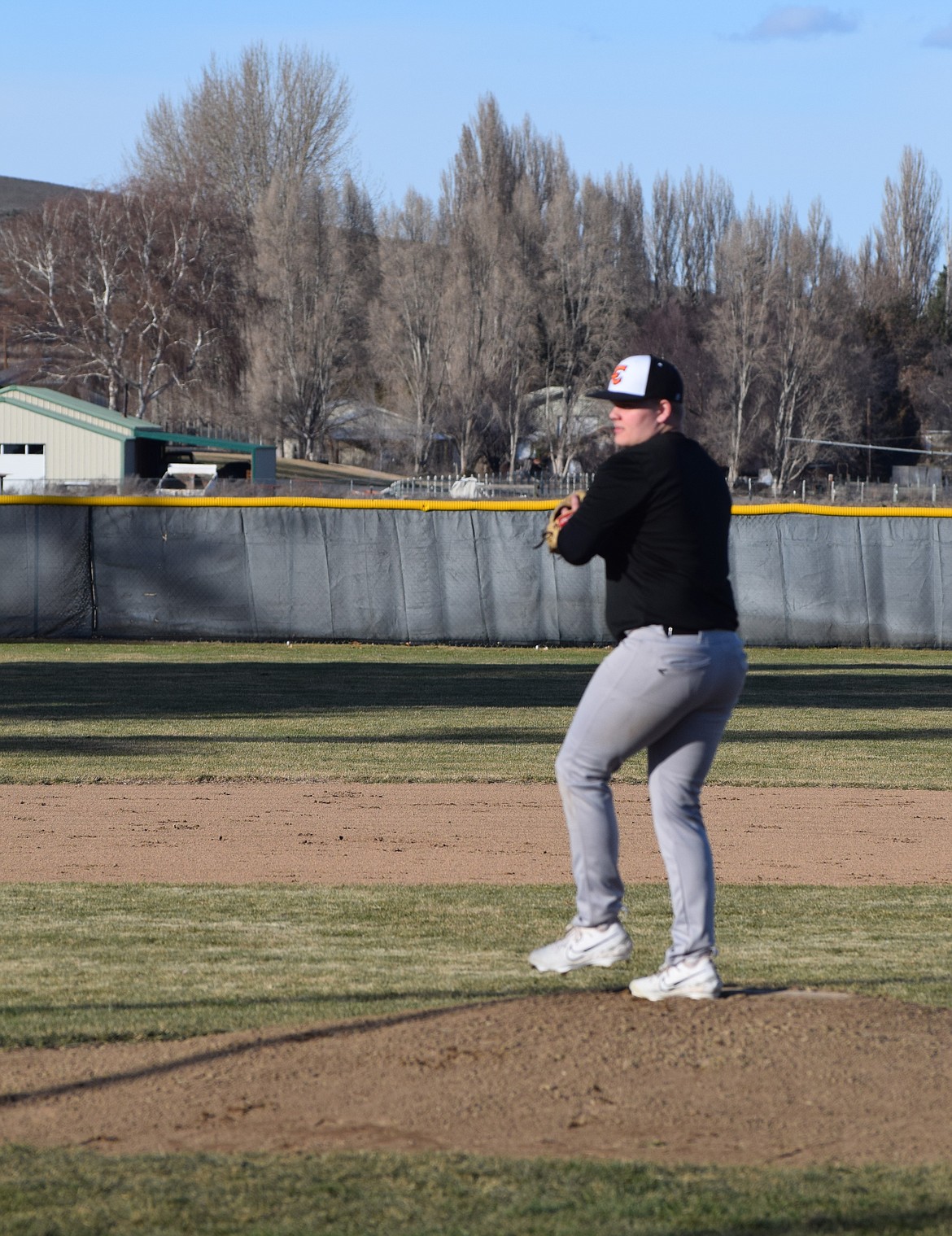 A Tiger pitcher goes through a drill during Tuesday’s practice. Pitching is expected to be a strong point for the Ephrata High School team this year.