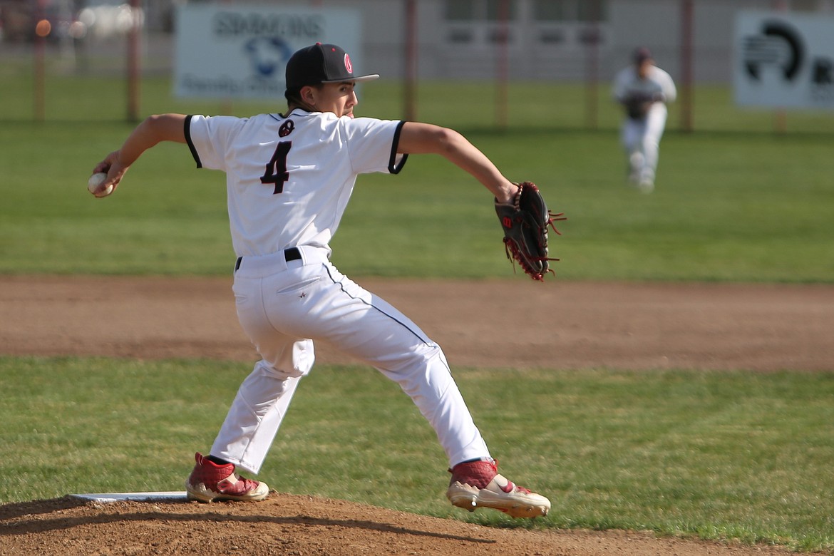 Othello junior Kal-El Ozuna pitches the ball during a game against Hazen last spring.