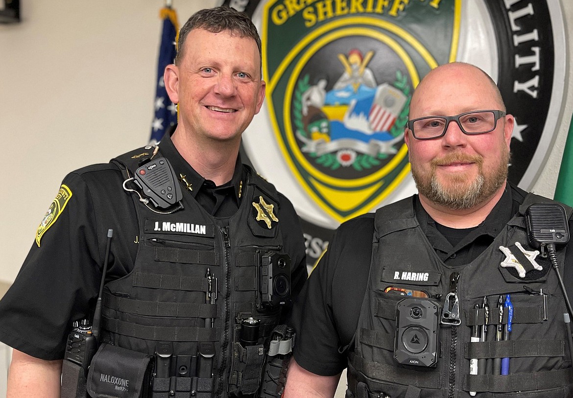 Grant County Sheriff’s Deputy Ryan Haring, right, shown here with Undersheriff John McMillan, was honored as the GCSO’s December 2023 Employee of the Month, the GCSO announced Thursday. Haring was recognized because of his dedication to the Moses Lake Sand Dunes and spending his off-duty time making sure the dunes are safe for recreation, according to Chief Deputy Josh Sainsbury.