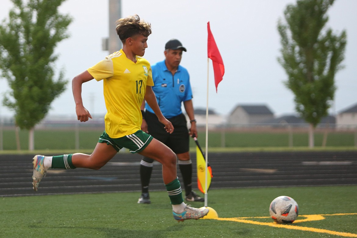 Quincy sophomore Erick Zepeda takes a corner kick during the 2023 season.