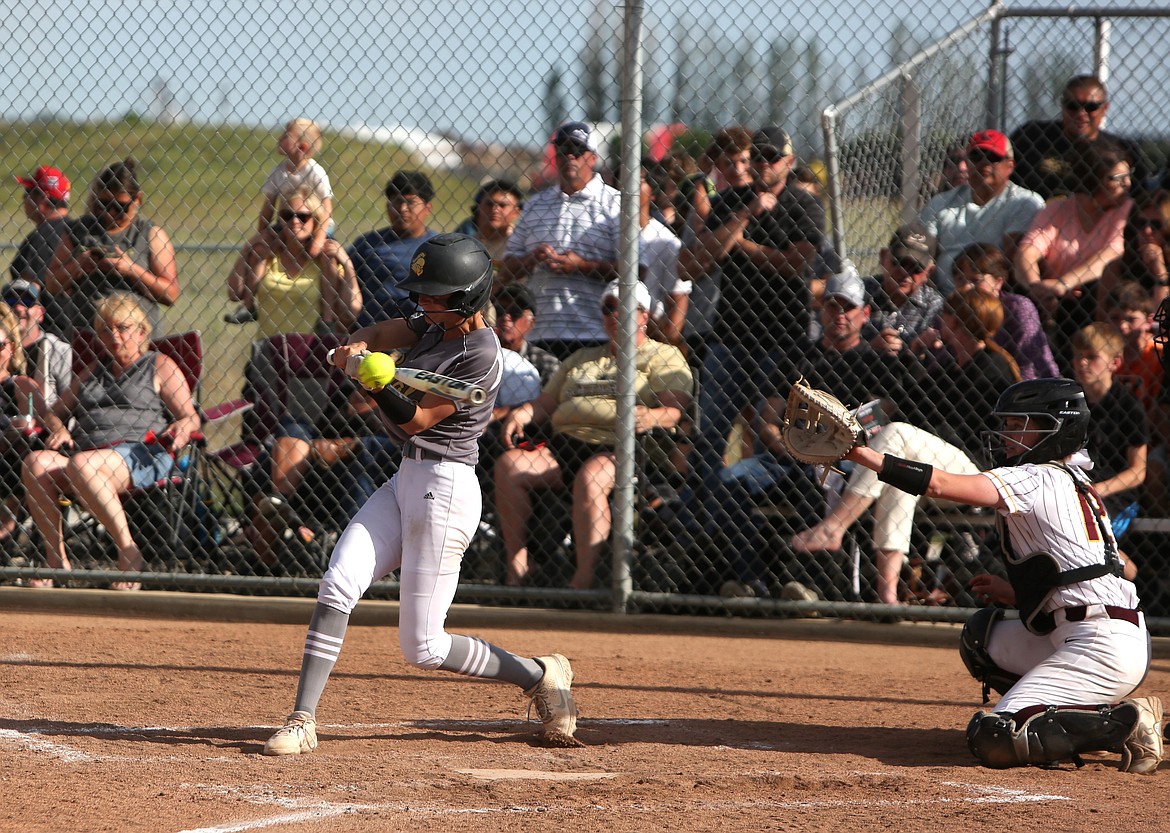 Royal shortstop Raegan Wardenaar makes contact with a pitch against Moses Lake in 2023. Wardenaar is one of three returning seniors on the Knights softball squad.