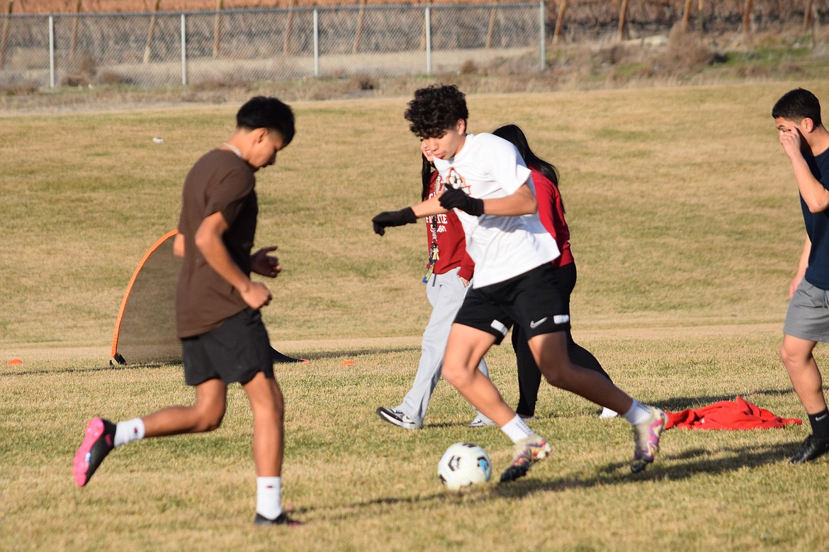 Wahluke Soccer players perform practice drills outside Wahluke High School March 4.