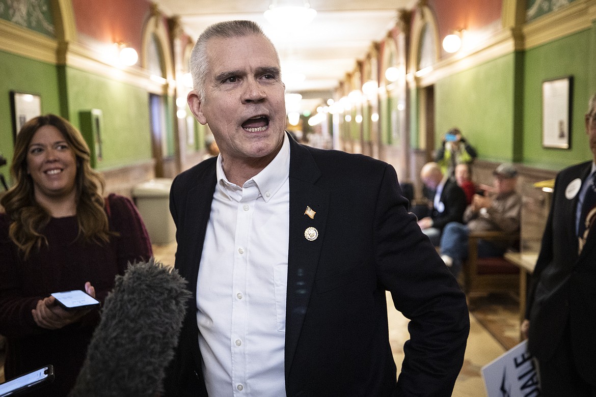 U.S. Rep. Matt Rosendale, R-Mont., speaks with reporters after filing to run for the U.S. Senate on Friday, Feb. 9, 2024 in the Montana State Capitol in Helena, Mont. Rosendale announced Friday, March 8, he would no longer be seeking re-election — the second time he's filed and dropped out of a congressional race in the past month. (Thom Bridge/Independent Record via AP, File)