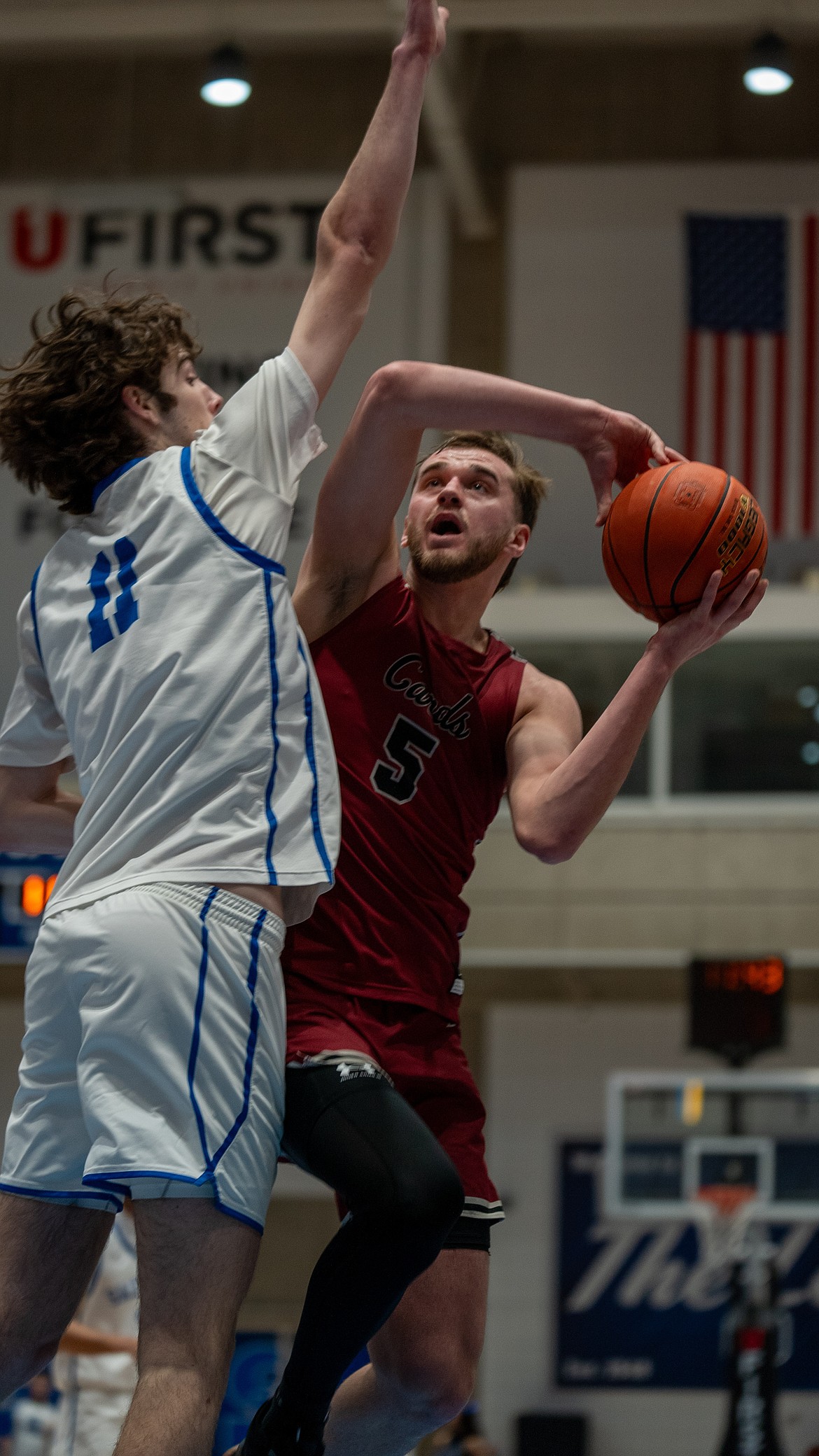 NIC ATHLETICS
North Idaho sophomore forward Kyle Karstetter attempts to get around Salt Lake's Coen Collier in the second half of Friday's Region 18 tournament semifinal at Bruin Arena in Taylorsville, Utah.