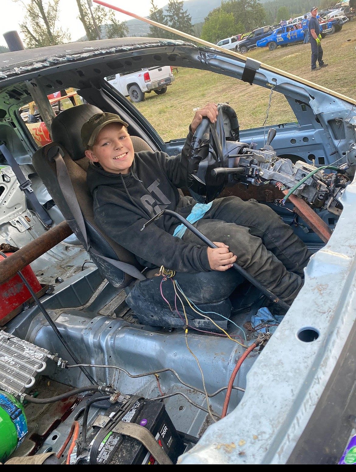 Jacob Hall sits in his first place winning derby car. (photo provided)