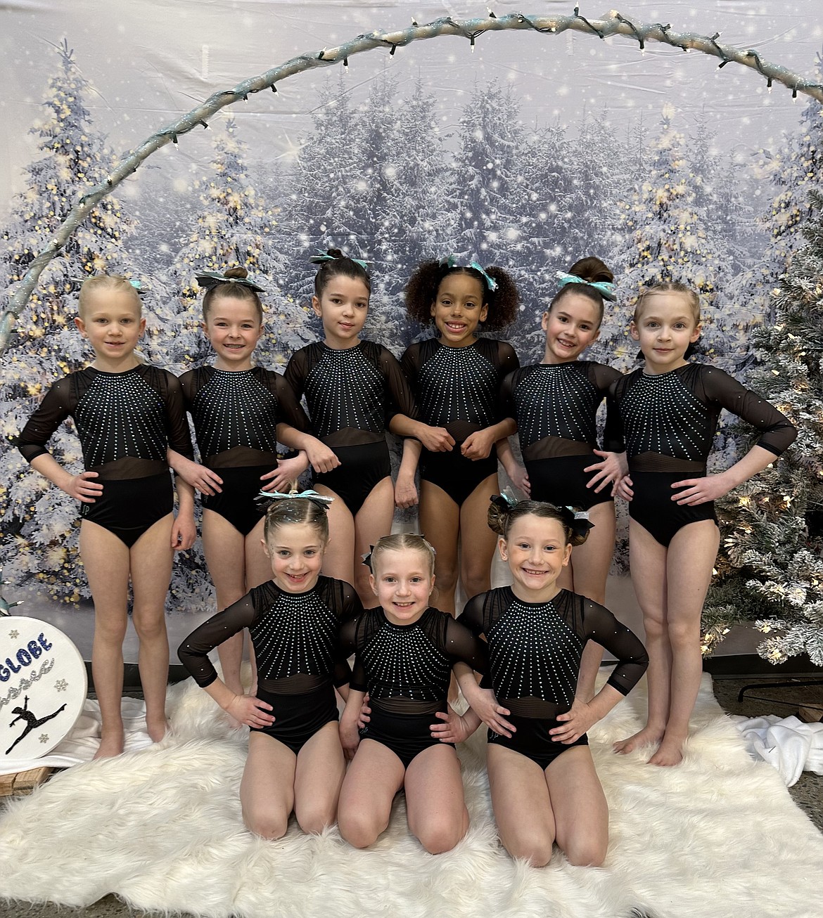 Courtesy photo
Avant Coeur Gymnastics Level 3s took 1st Place Team at the Snowglobe Classic Invitational in Post Falls. In the front row from left are Lacey Bitnoff, Lydia Mohr and Paisley Moore; and back row from left, Abba Dellara, Brinley Enns, Isla Moore, Sunny Monteith, Avonlea Cotton and Shea McGinnis.