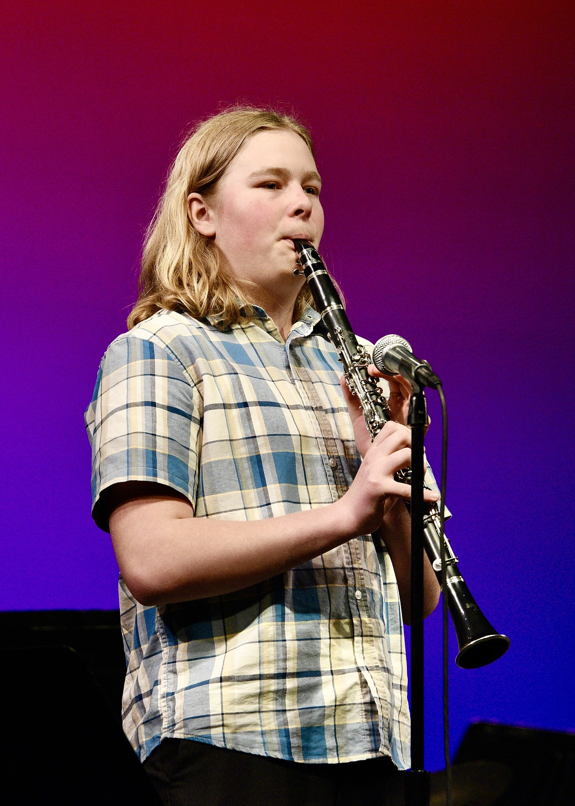 Clarinetist Cohen Gates steps up for a solo during the Whitefish Middle School Jazz Ensemble spring concert on Thursday, March 7, 2024. (Matt Baldwin/Whitefish Pilot)