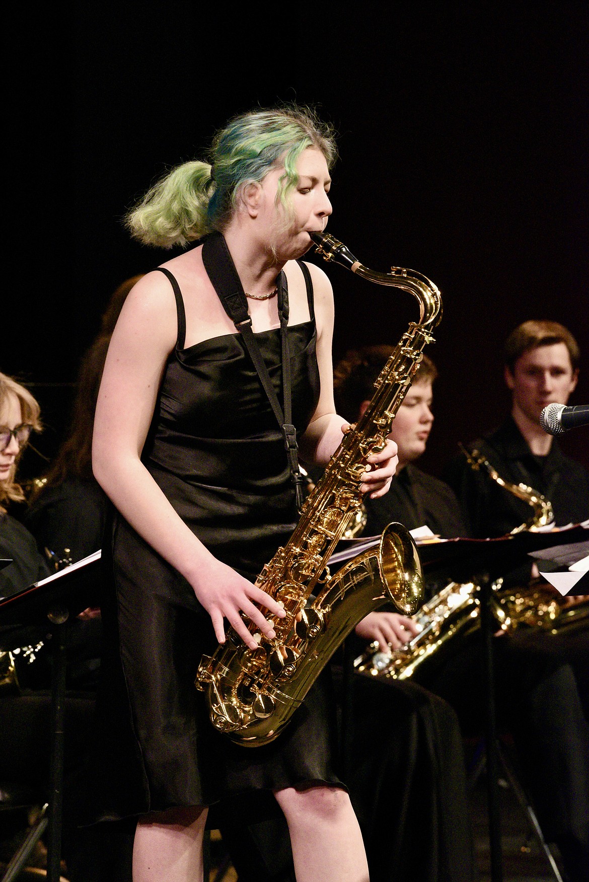 Tenor saxophonist soloist Sasha Johnston performs with the Whitefish High School Jazz Ensemble during the spring concert on Thursday, March 7, 2024 at the Whitefish Performing Arts Center. (Matt Baldwin/Whitefish Pilot)