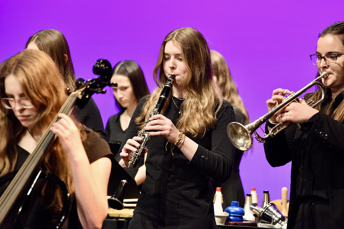 Lillian Nelson on the cello, Mikayla Hebert on clarinet, and student teacher Sydney Eastwood on trumpet during the Whitefish High School Jazz Ensemble spring concert on Thursday, March 7, 2024 at the Whitefish Performing Arts Center. (Matt Baldwin/Whitefish Pilot)