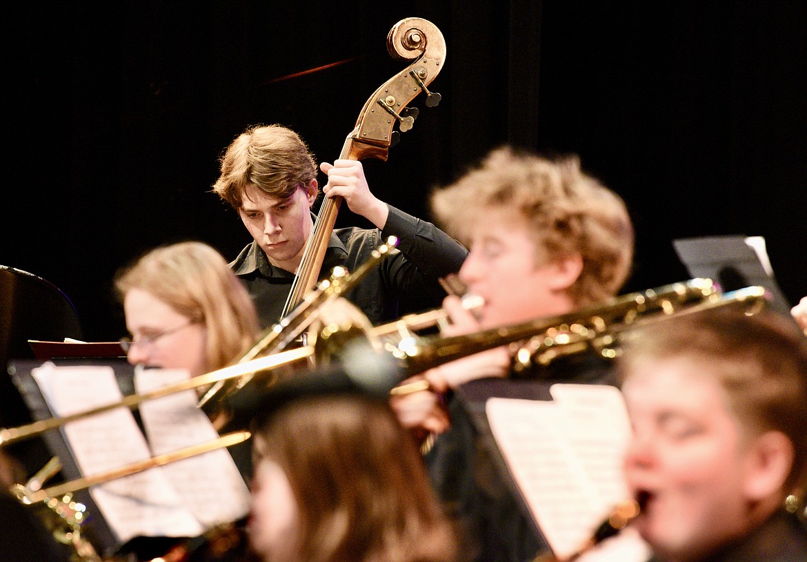 Bass player Connor Cornutt performs with the Whitefish High School Jazz Ensemble during the spring concert on Thursday, March 7, 2024 at the Whitefish Performing Arts Center. (Matt Baldwin/Whitefish Pilot)