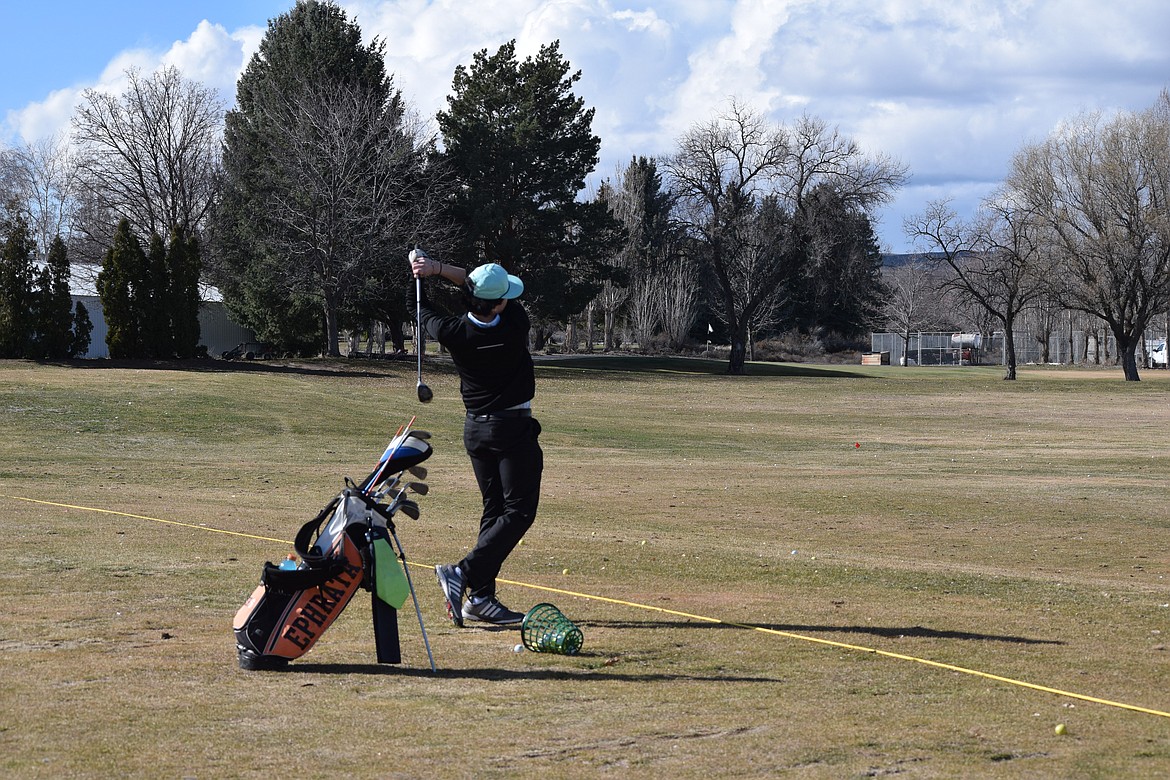 Tristan MacNeil follows through on a swing during practice at Lakeview Golf & Country Club Tuesday afternoon. His coach said MacNeil shows a great deal of promise on the course.