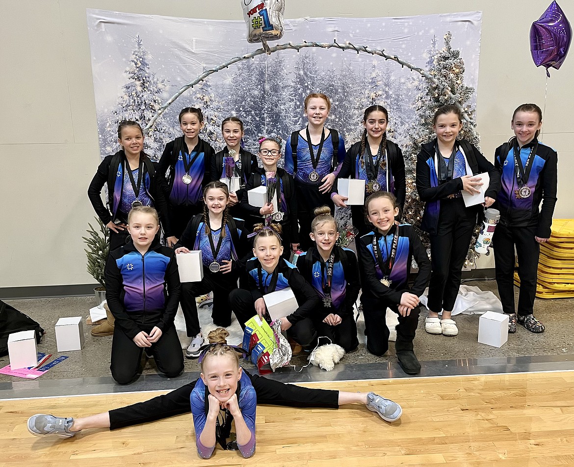 Courtesy photo
GEMS Athletic Center Silver team competed at the Snowglobe Classic March 8-10 in Post Falls. In the front is Skylar Bingham; second row from left, Ellie Batchelder, Emma Ward, Olive Buttars, Riley Krebs and Ava Wittman; and back row from left, Annabeth Gambrino, Kalea Pham, Racine Dudley, Faith Robertson, Emma Linder, Katelynn Clark, Zoey Brown and Ani Hall. Not pictured is Olivia Smith.