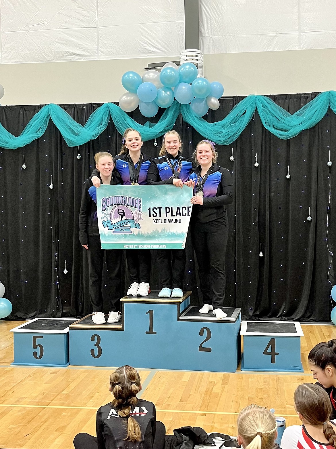 Courtesy photo
GEMS Athletic Center Diamond Team won 1st Place team at the Snowglobe Classic on March 8-10 in Post Falls. From left are Kylie Burg, Evelyn Oswell, Evyn Lyon and Dakota Caudle.