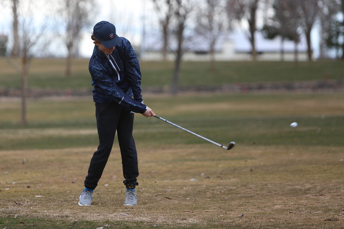 Lind-Ritzville/Sprague freshman Jase Bowman hits an approach shot during practice at the Ritzville Golf Course.