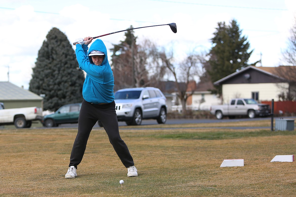 Broncos sophomore golfer Beau Fode tees off during practice Tuesday afternoon.