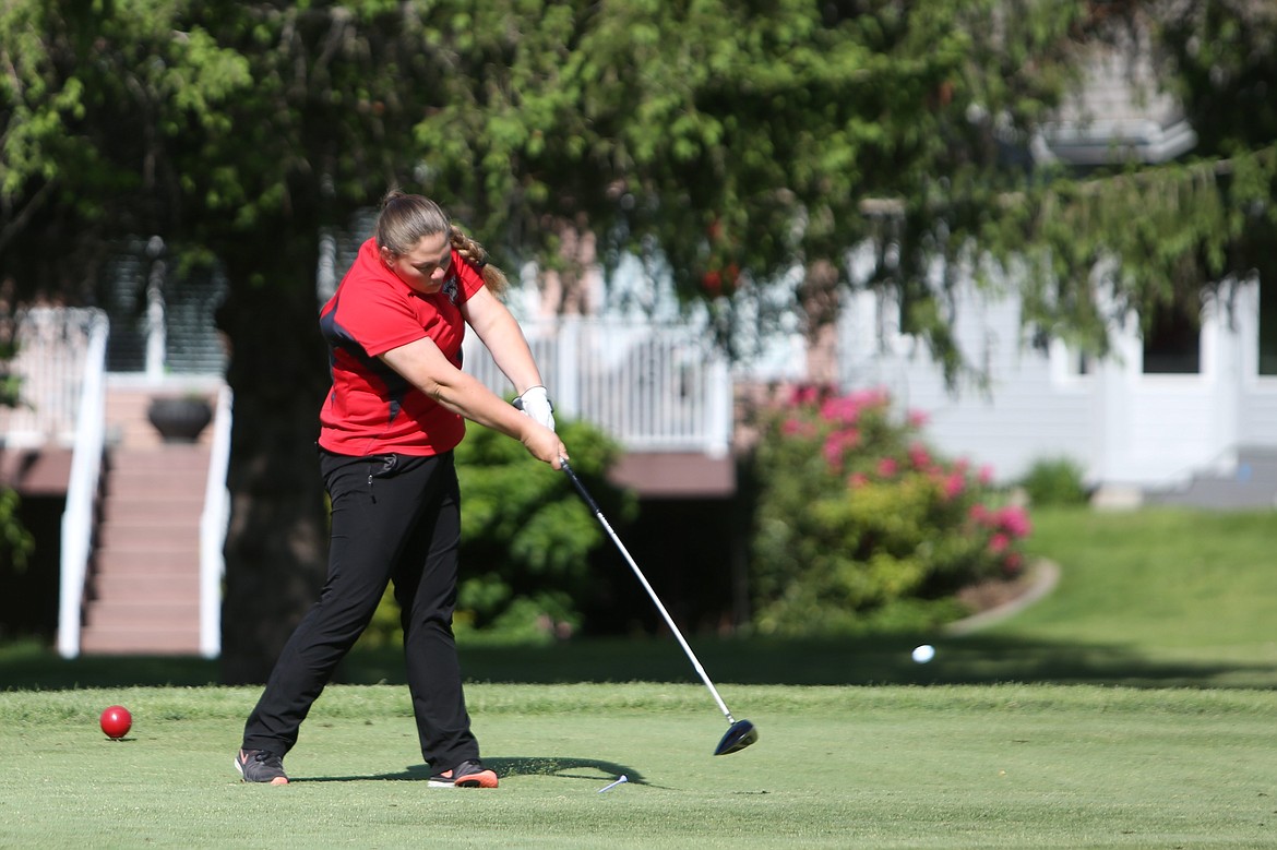 Othello Girls Golf player Sami Shade drives a ball at the first tee box at the MeadowWood Golf Course in Liberty Lake, competing in the 2023 2A Girls State Golf Tournament last spring. Shade returned for the 2024 season, now a junior.