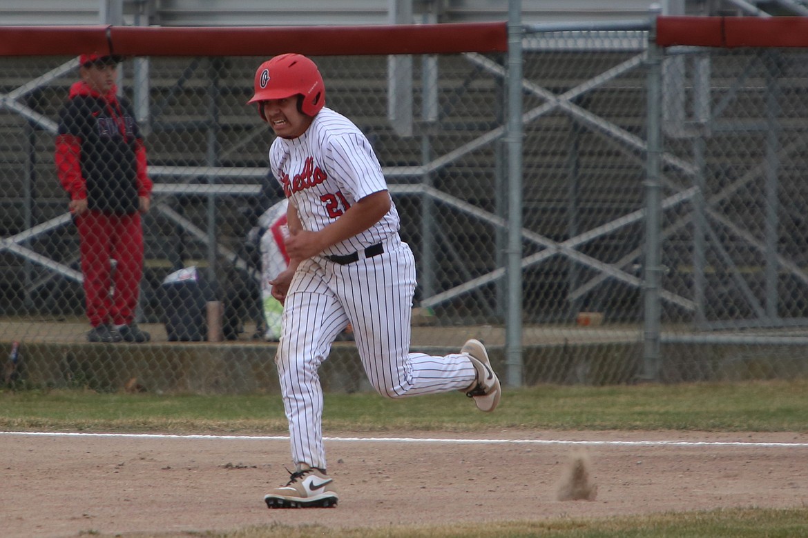 Othello freshman Xyvvn Martinez runs to second base.