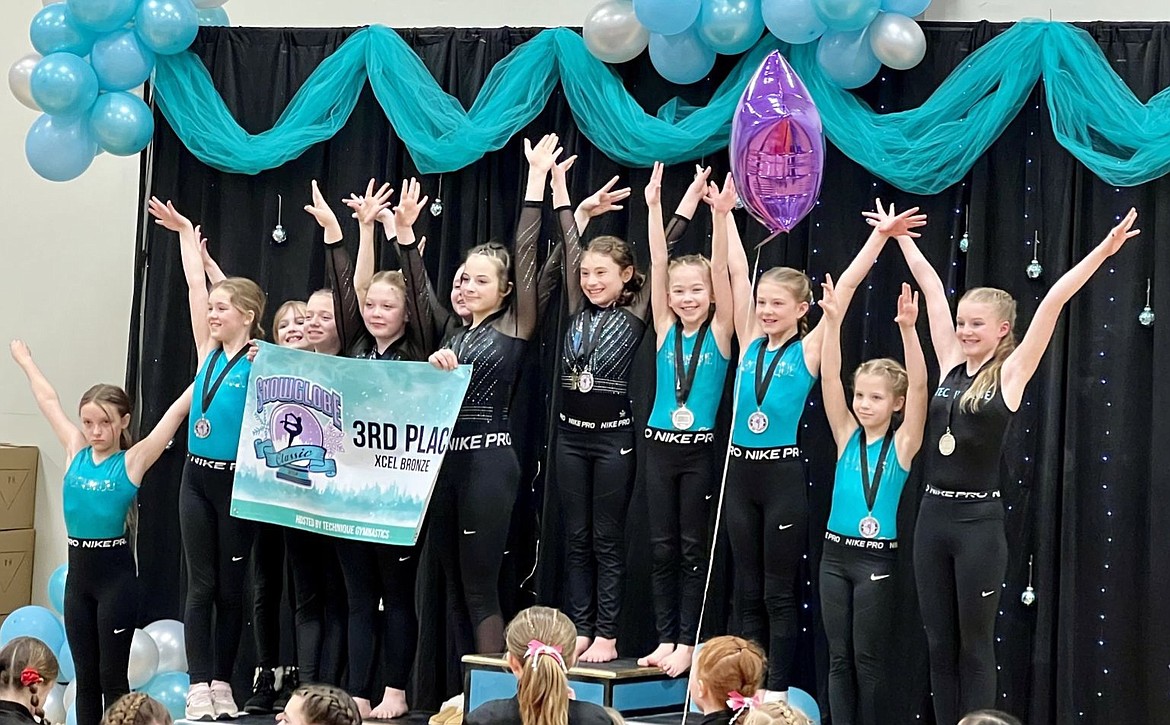 Courtesy photo
Technique Gymnastics Xcel Bronze team competed at its 8th annual Snowglobe Classic in Post Falls and received 3rd place team award. From left are Autumn Turcott (BB 8.875), Ragon McCracken (UB 9.25), Aurora Cook (3rd UB), Elli Bennett (FX 9.025), Violet Matlock (2nd AA & BB, 3rd FX & UB), Emberly Mcrae (2nd VT, 3rd UB & BB), Khloe Perkl (2nd AA & BB, 1st UB 2nd BB, 3rd FX) , Raighlyn Kropf (1st FX), Kai Hundt (3rd FX), Mia Jones (BB 8.95), Charlotte Nasseth (UB 9.325) and Charlotte Heaton (FX 9.25).