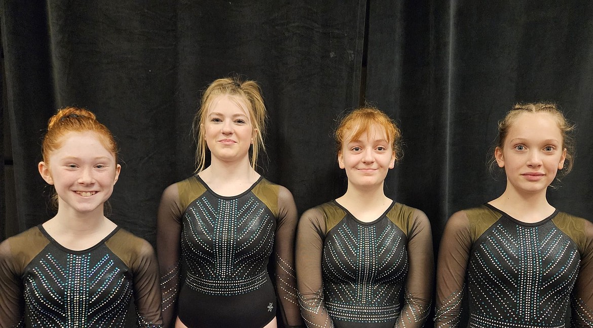 Courtesy photo
Technique Gymnastics Xcel Platinum team competed at its 8th annual Snowglobe Classic in Post Falls. From left are Vera Evans (9.375 FX), McKenzie Labelle (FX 9.0), Sophie Phillips (3rd VT) and Melodie Wurster (3rd BB).