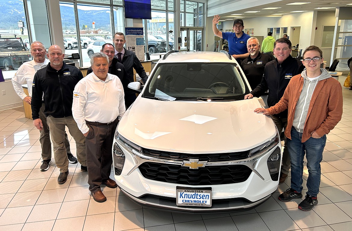 Some of the crew at Knudtsen Chevrolet join Brian Hansen around the 2024 Trax he was given on Wednesday.