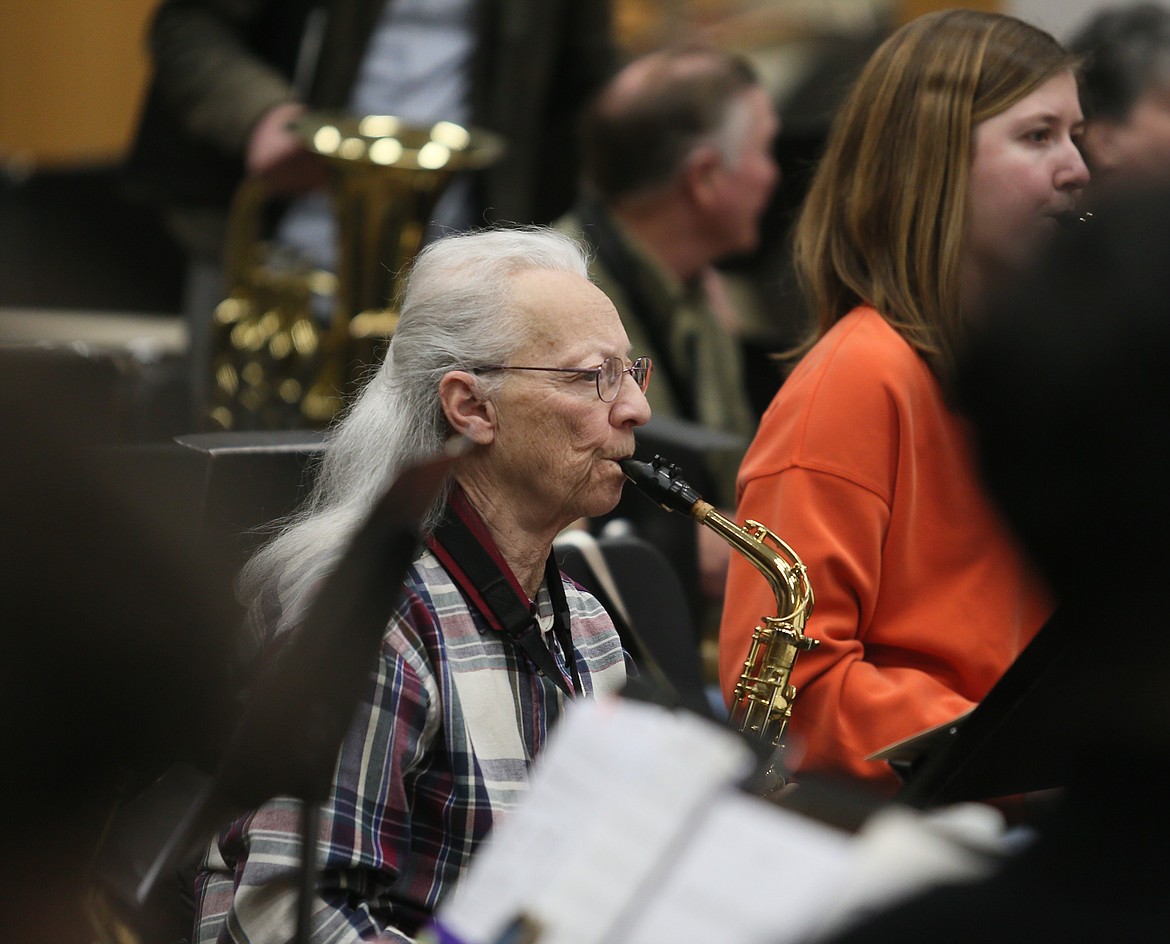 Alto sax player Linda Barnett, 76, has been a North Idaho College Wind Symphony member since the group's inception 50 years ago. She has performed about 250 times with the symphony. She is seen here during a March 6 rehearsal.