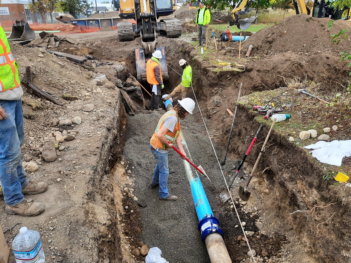 Crews work on Phase 1 of the the Hayden Lake Irrigation District's water mainline
replacement project in Hayden.