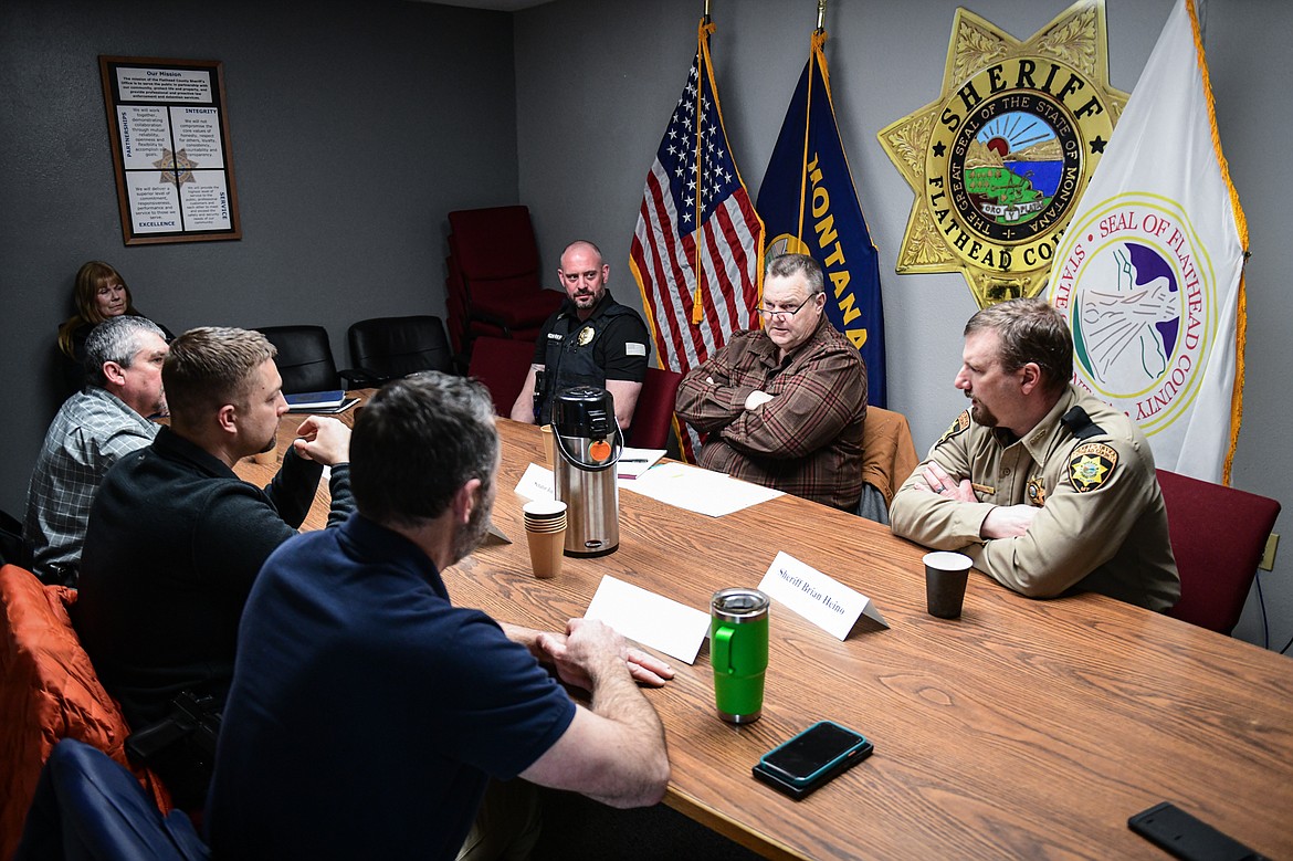 U.S. Senator Jon Tester attends a roundtable discussion on crime prevention, fentanyl trafficking and border security efforts with, clockwise, Flathead County Sheriff Brian Heino,     Whitefish Police Deputy Chief Kevin Conway, Kalispell Police Chief Jordan Venizio, Lincoln County Sheriff Darren Short and Columbia Falls Police Chief Clint Peters at the Flathead County Sheriff's Office in Kalispell on Friday, March 15. (Casey Kreider/Daily Inter Lake)